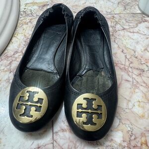 Tory Burch Black Flats with Gold Emblem